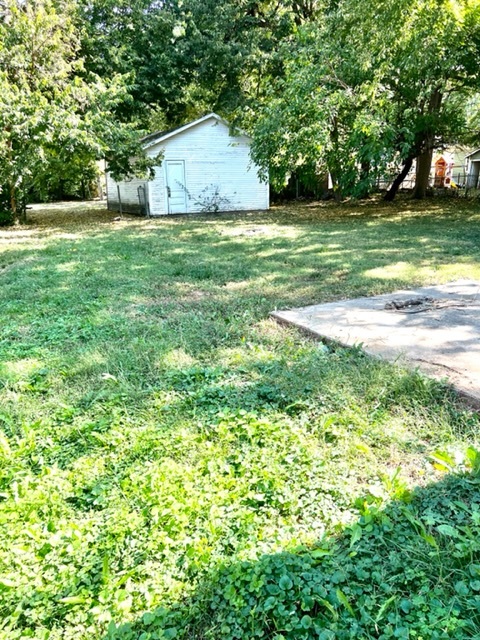 Back Yard w/ Garage - 1020 N Main Ave