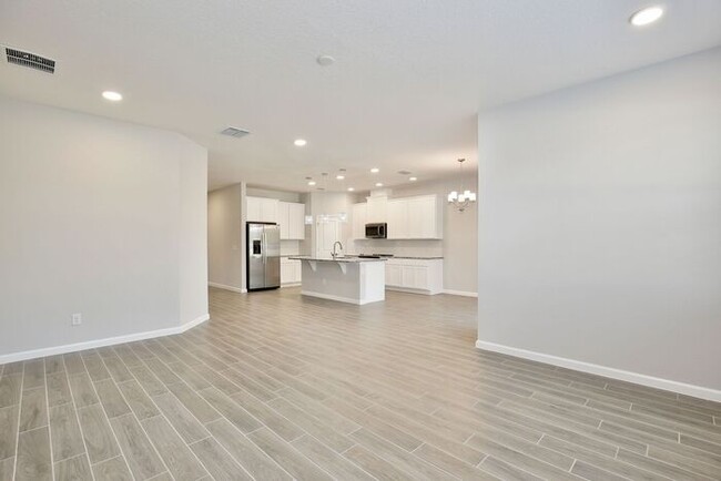 Building Photo - Gorgeous 4/3 Brand New Home with a Spaciou...