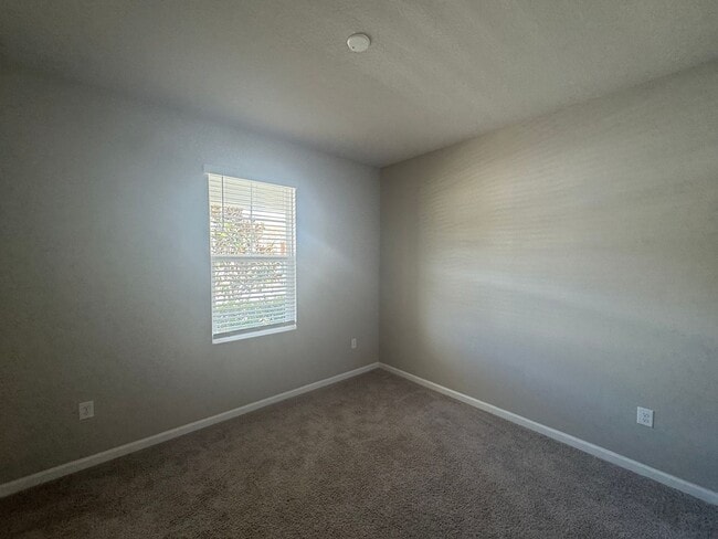 Building Photo - Where Modern Comfort Meets 4BD/3BA Hometown Charm — Your Story Begins in Okahumpka! FULLY-FENCED!...