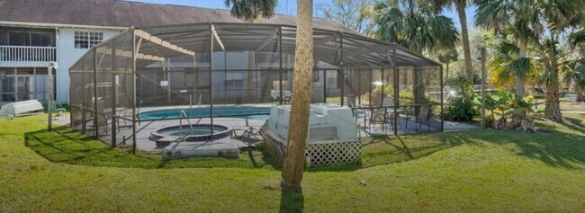 Building Photo - Wonderful remodeled Waterfront Condo == Great I-4 location with Community Pool