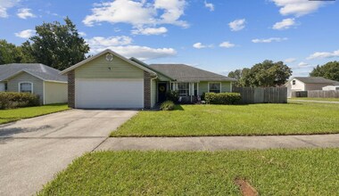 Building Photo - private - backyard fenced in large master suite!
