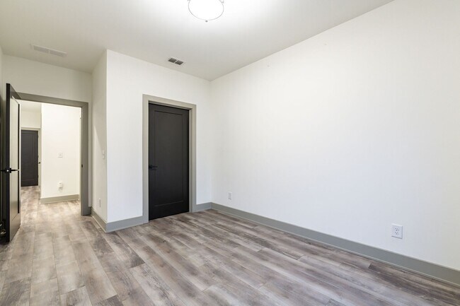 Building Photo - Modern Living Meets Walkable City Charm in...