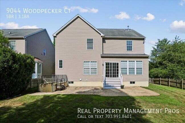 Building Photo - 9044 Woodpecker Ct