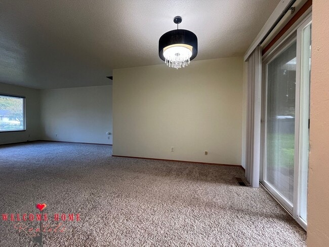 Building Photo - Beautiful Remodeled Rambler!!!  Come enjoy this HUGE backyard!!  NEW CARPET!!