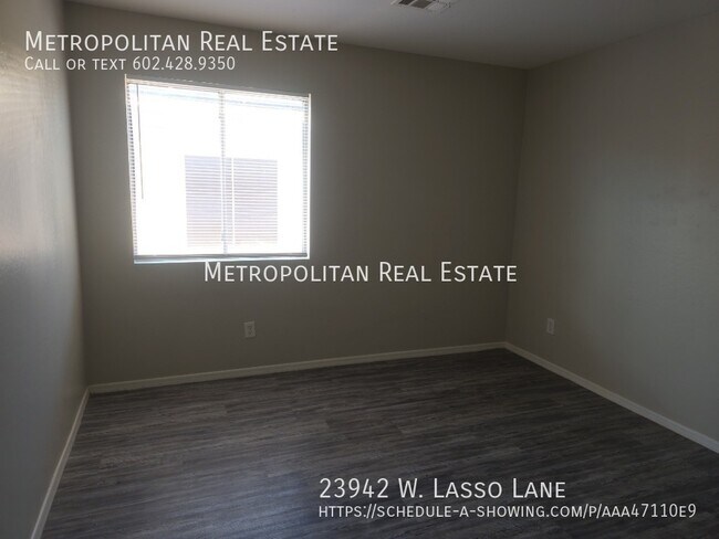 Building Photo - 23942 W Lasso Ln