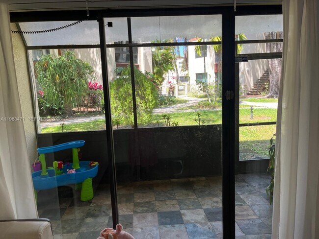 Building Photo - 301 N Pine Island Rd