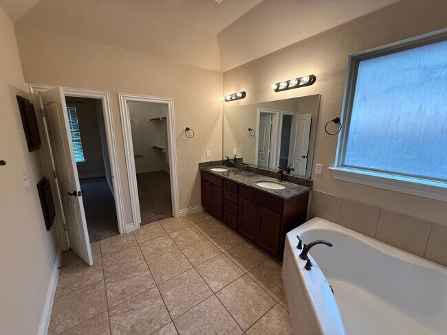 Building Photo - 3 bedroom + office  or 4th bedroom, storm shelter, neighborhood pond and walking track!