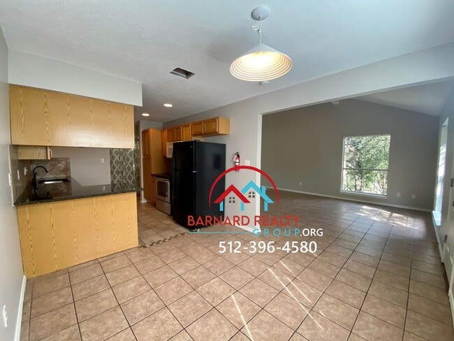 Building Photo - Available July 11: 3 bedroom, 2.5 Bath Duplex with Garage and Fenced Yard