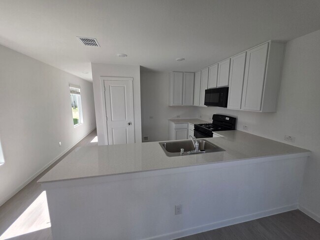 Building Photo - Your Next Chapter Starts Here: 4-Bedroom H...