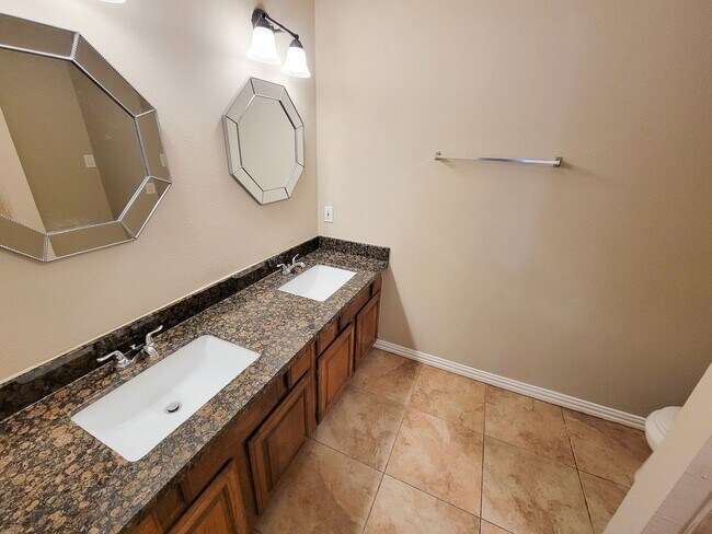 Building Photo - BEAUTIFUL 3 BEDROOM 2 BATH UPDATED HOME WITH TILE THROUGHOUT. GRANITE COUNTERTOPS WITH TILE FLOOR...