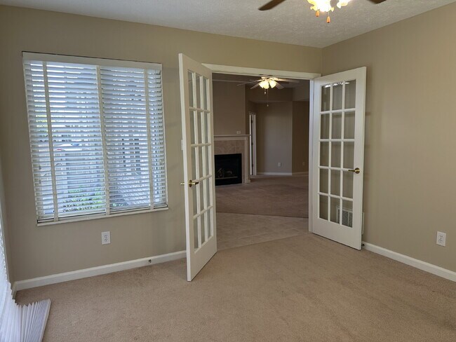 Building Photo - Well-Maintained Condo with 2 Bonus Rooms & Attached 2-Car Garage