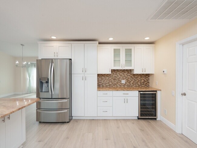 Building Photo - 3 BEDROOM • 2 BATHROOM • PRIVATE POOL • WATERFRONT • BOAT LIFT • ZERO DEPOSIT MOVE-IN AVAILABLE