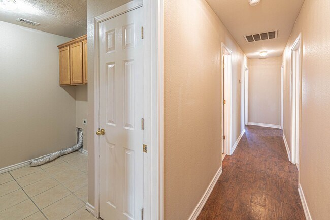 Building Photo - Available August 2026! 3 Bedroom 3 Bathroom Duplex with Fenced Yard!