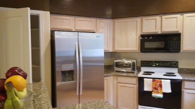 Building Photo - Luxurious 2-Bed/2-Bath Condo in Quiet Gated Community - Coming Soon!