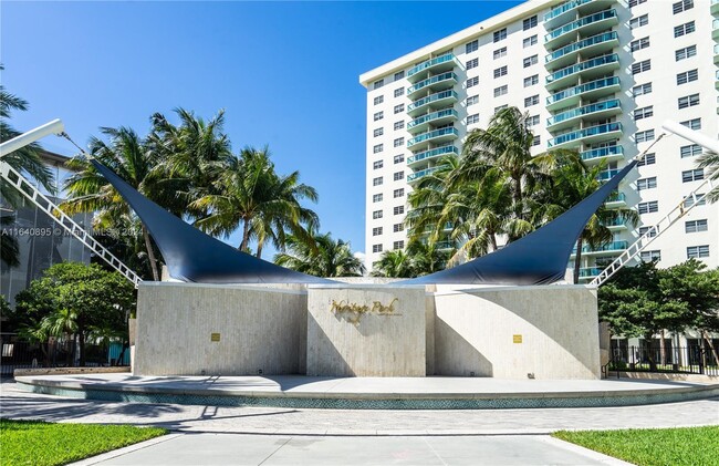 Building Photo - 19370 Collins Ave