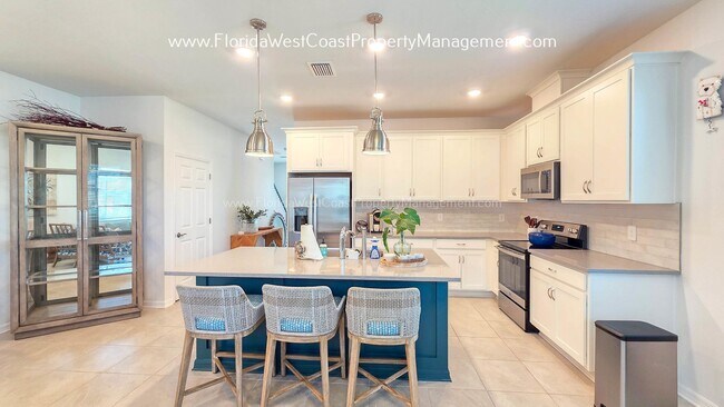 Building Photo - EXCEPTIONAL AND SPACIOUS FURNISHED TOWNHOME WITHIN WATERSIDE- NAUTIQUE!