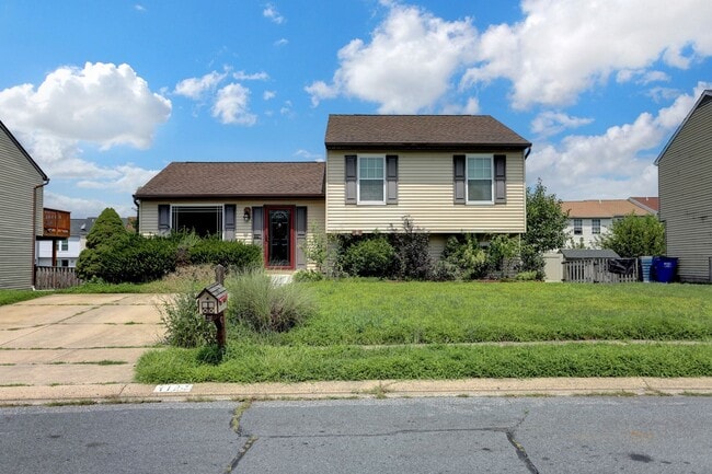 Building Photo - Spacious 4-Level Home with Deck, Workshop ...