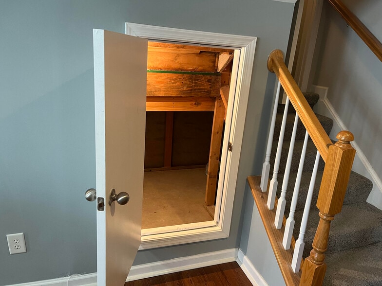 There is plenty of extra storage under the staircase if needed. - 7837 Heaton Way