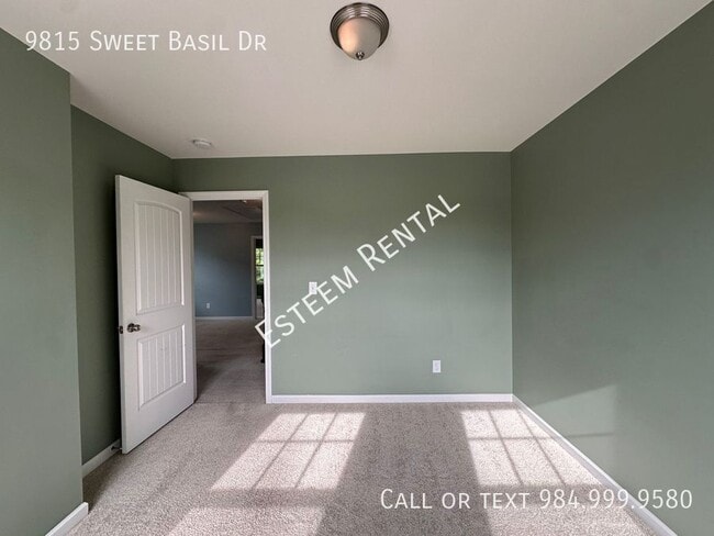 Building Photo - 9815 Sweet Basil Dr