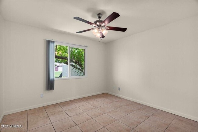 Building Photo - 7842 E Rovey Ave
