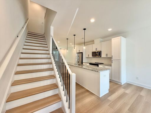 Building Photo - **OFFERING $125 RENT DISCOUNT FOR FIRST 6 MONTHS** Newly Built 4BD, 3.5BA Raleigh Townhome in a G...