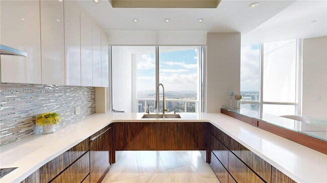 Building Photo - 18201 Collins Ave