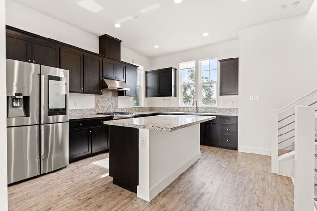 Building Photo - Sun-Filled Corner 4BR w/ Dual Yards & Panoramic Indoor-Outdoor Flow