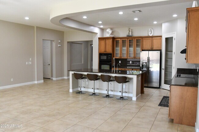 Building Photo - 9539 W Harmony Ln
