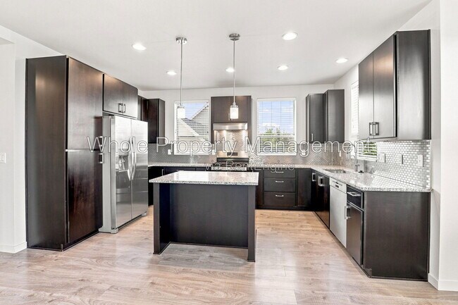 Building Photo - 9004 E 49th Pl
