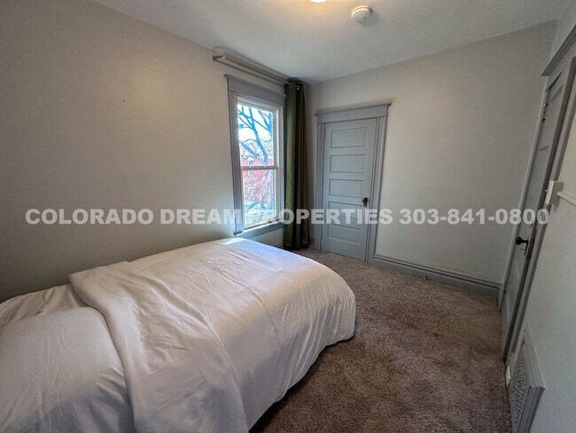 Building Photo - A home where old-world charm meets modern sophistication!