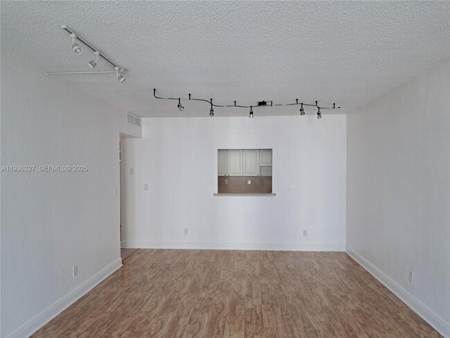 Building Photo - 19380 Collins Ave