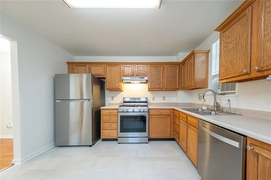 New stainless steel appliances with lots of cabinet and countertop space - 114 Miltenberger St
