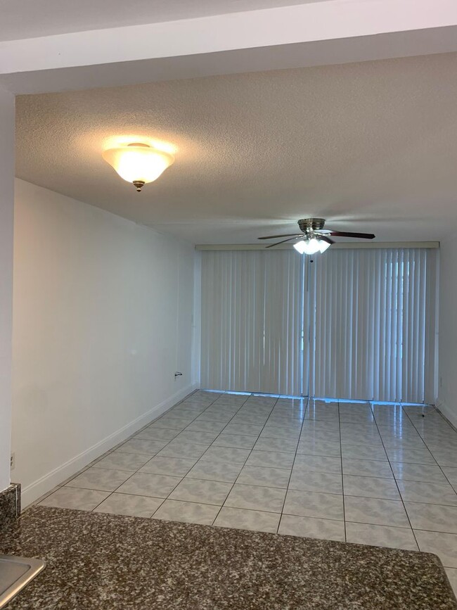 Building Photo - For Rent: Spacious One-Bedroom with Den in...