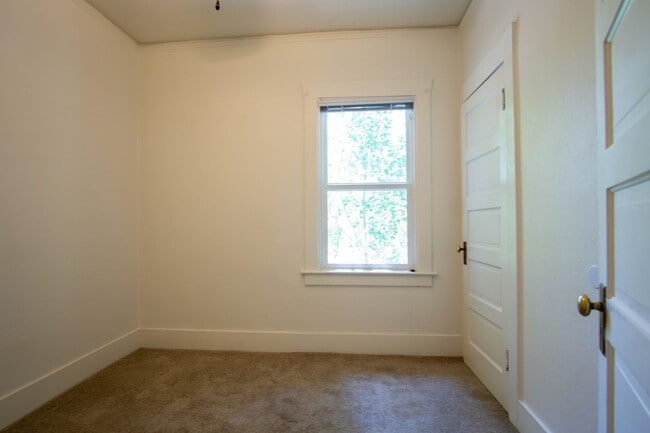 Building Photo - Lease this Beautiful Sullivan's Gulch Vintage 2-Bed w/Sunroom!