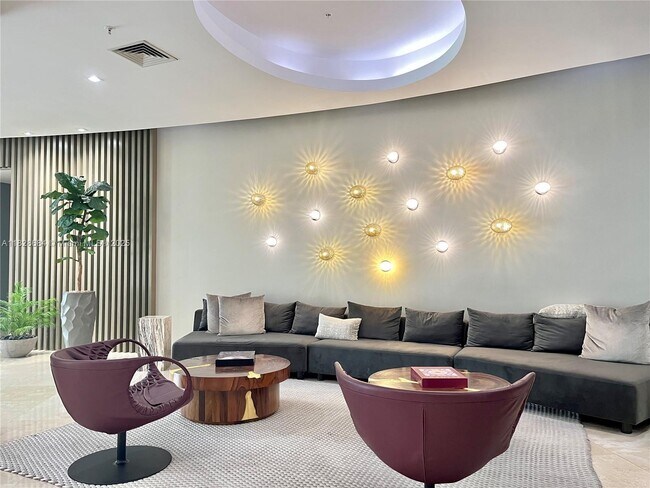 Building Photo - 10275 Collins Ave