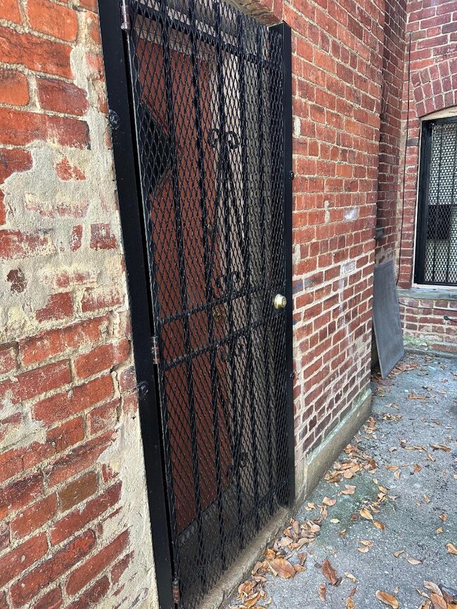 Side door/gate to utility room - 1336 Kenyon St NW