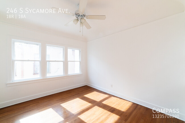 Building Photo - A Grand, Light-Filled 1-Bedroom with Bonus...