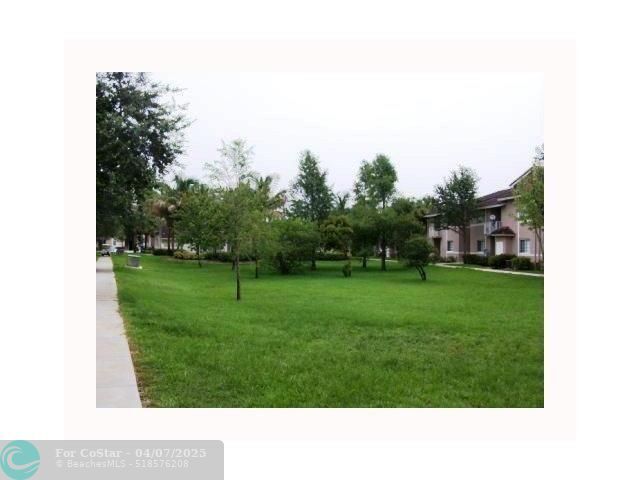 Building Photo - 3241 Sabal Palm Manor