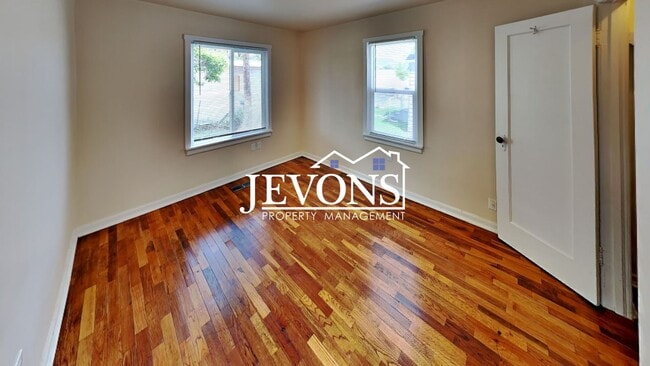Building Photo - Step into your new residence, a charming s...