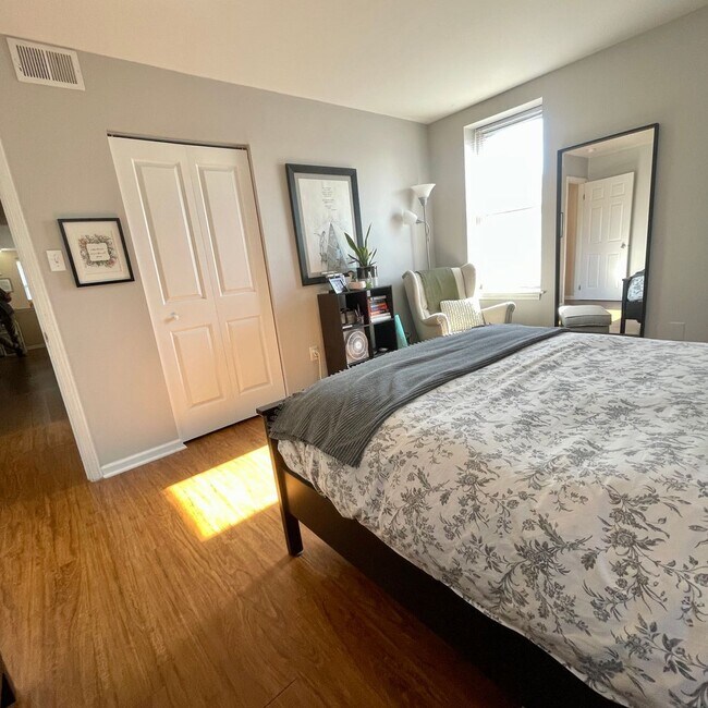 Primary Photo - SPACIOUS bi-level apartment with fenced yard