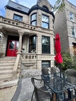 Historic Greystone built in 1909 with original woodwork,  hardwood floors and curved windows - 938 W Newport Ave