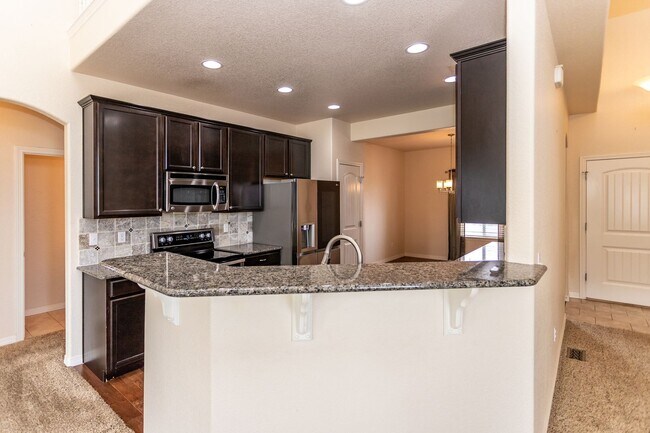 Building Photo - Spacious 5-Bedroom Home with Finished Base...