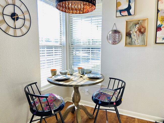 Dining area doubles as a workspace - 7685 Northcross Dr