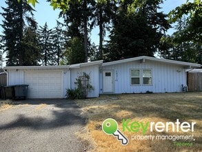 Building Photo - Beautiful 4-Bedroom Rambler in a Desirable...