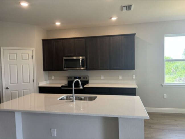 Building Photo - Brand New 4 Bedroom 3 bath 3 Car Garage Ho...