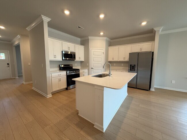 Building Photo - "NEWLY BUILT- Spacious 4-Bedroom Haven with Granite Elegance and Cozy Fireplace in Harvest"