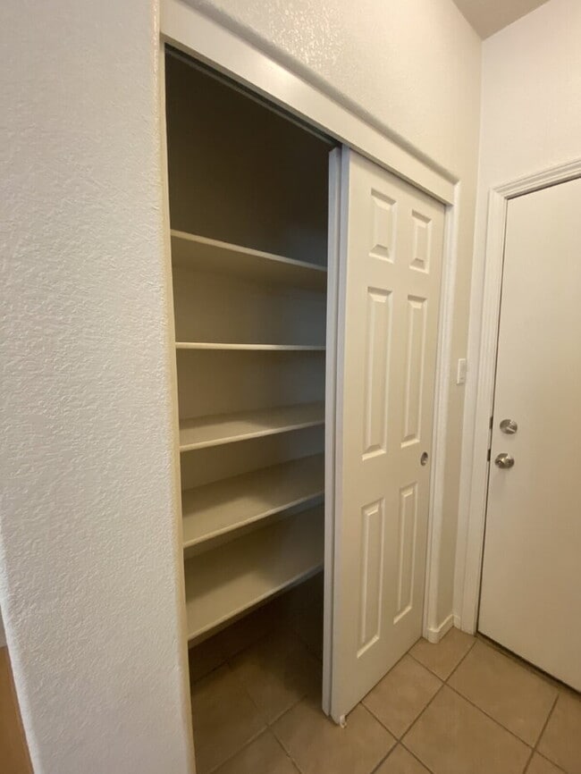 Building Photo - GATED COMMUNITY - 2 Story Townhouse - All BR Upper Level