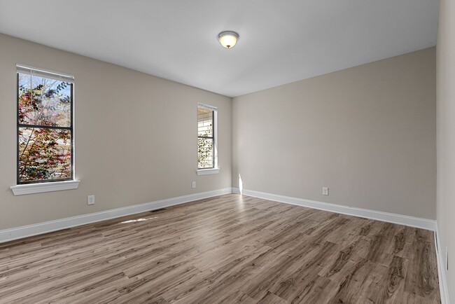 Building Photo - Two bedroom triplex in Raleigh: Available Now