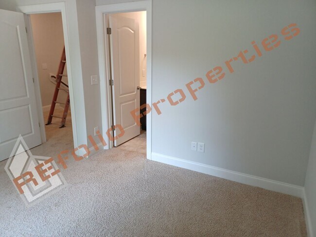 Building Photo - Built in 2022! 3 Story 3 Bedroom 1-Car Gar...