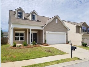 Building Photo - Enjoy this Open Floorplan includes 3 BD-2.5 BA - Master On Main - A Huge Loft/Bonus. Community Po...